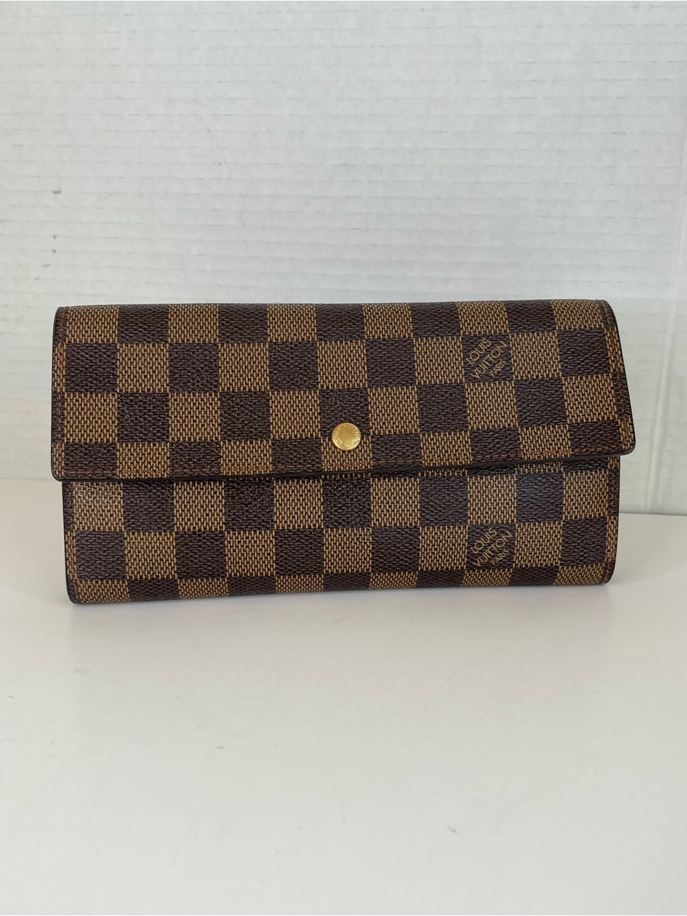 Louis Vuitton Sarah Wallet in Damier Ebene canvas